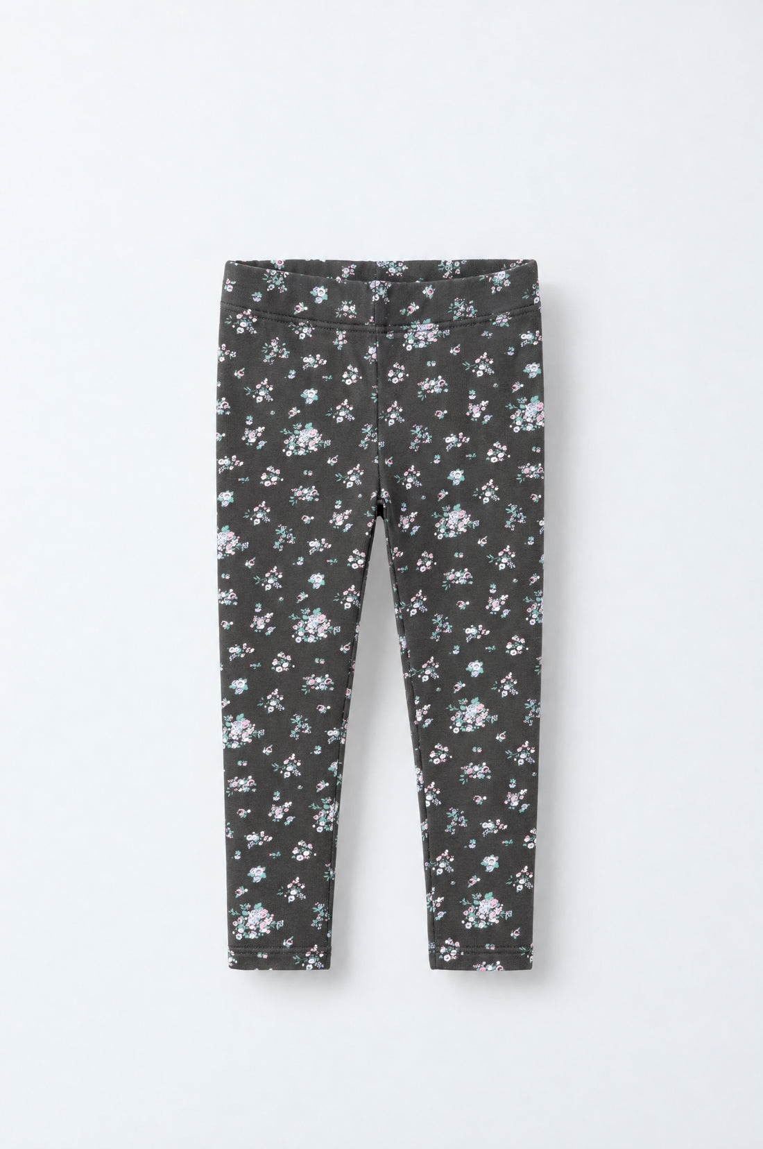 Baby girl charcoal leggings with pink, lilac, white and green floral print, elasticated waistband and neatly stitched leg hems.