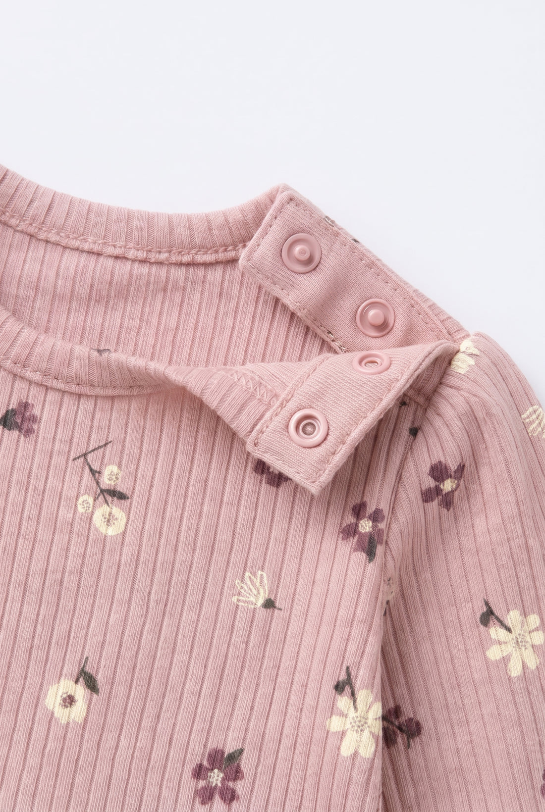 PTex Fashion baby girl long-sleeve dusty pink ribbed bodysuit with floral print and two-tier ruffle peplum