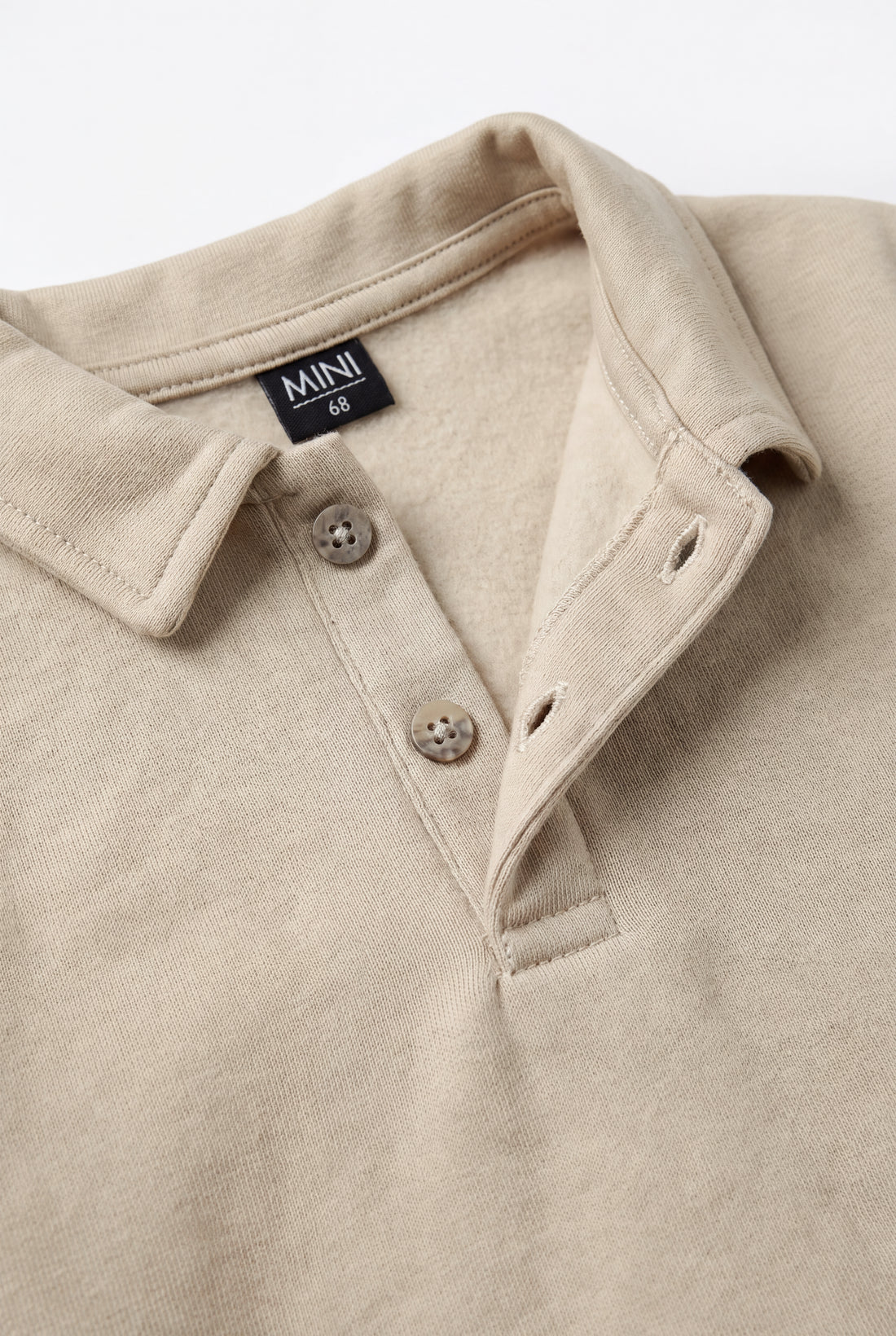 PTex Fashion beige baby polo sweatshirt with long sleeves, front view