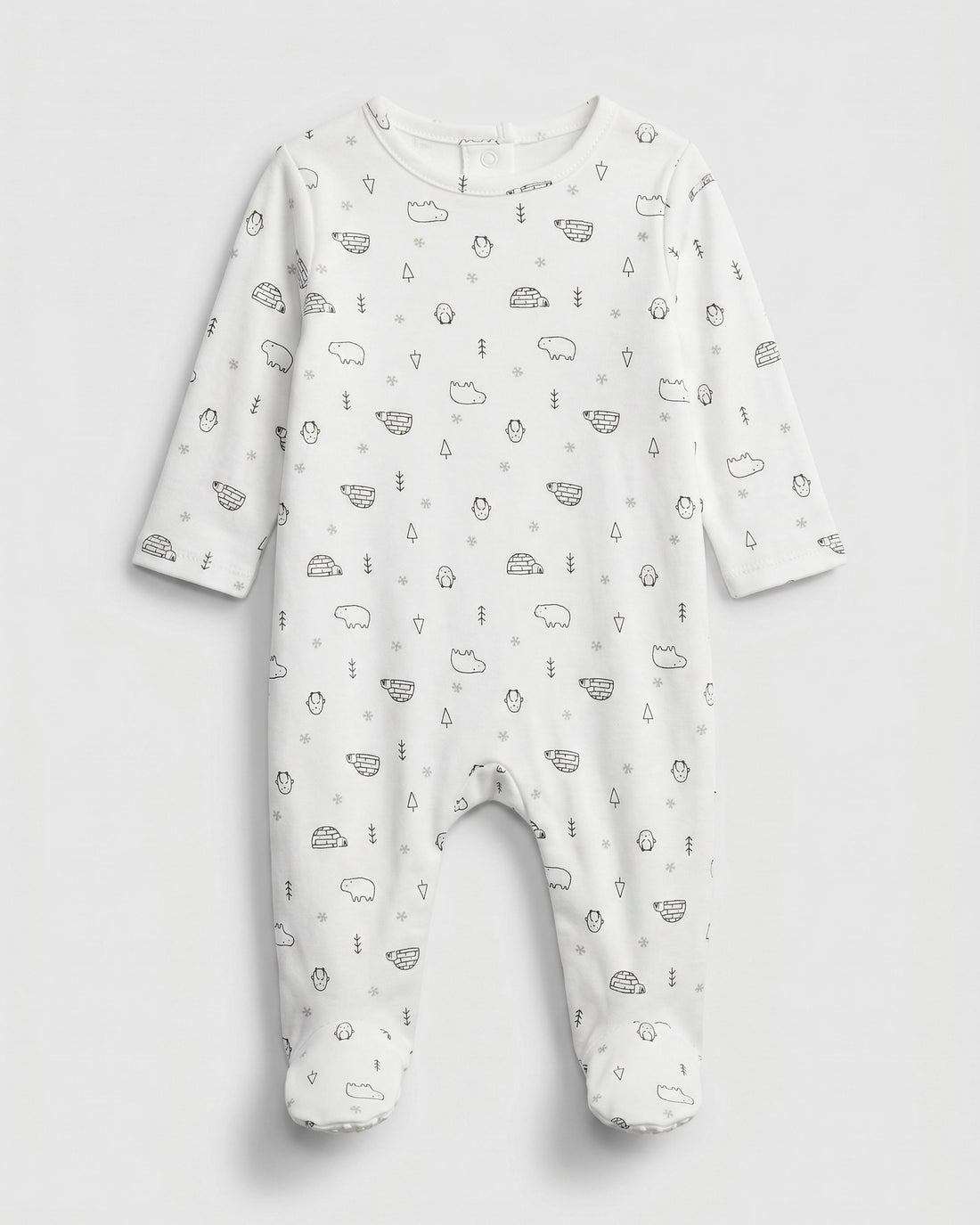 PTex Fashion off-white baby footed romper with allover arctic polar bear, penguin and igloo print, flat lay