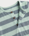 Close-up of sage green and slate blue striped baby romper neckline with three-button henley placket — PTex Fashion