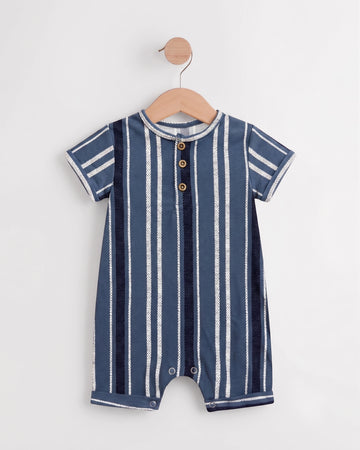 Blue striped baby romper on a wooden hanger showing button placket and leg press studs — PTex Fashion