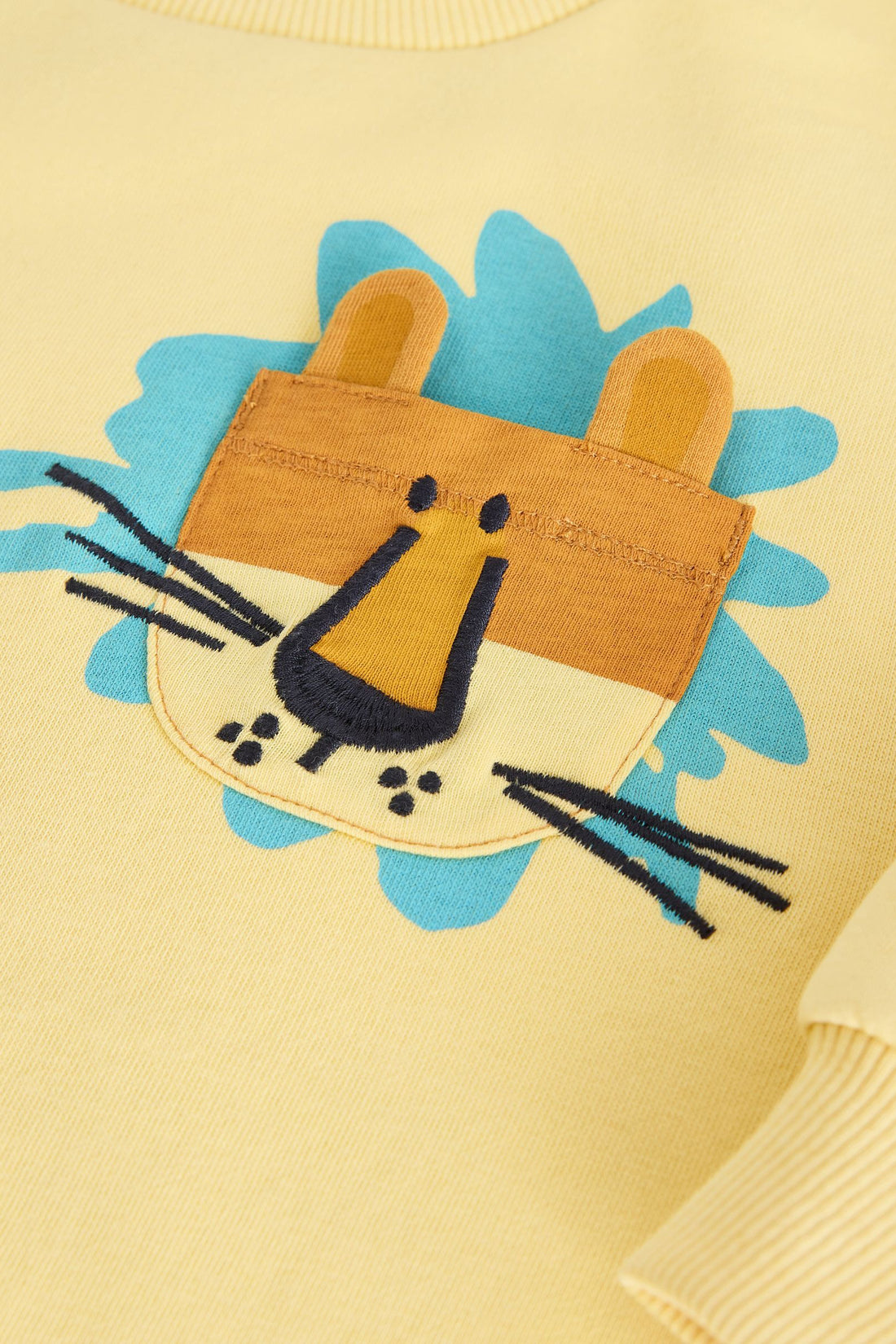 Baby toddler drop-shoulder sweatshirt with ribbed neckline, cuffs, hem and playful character appliqué chest detail.