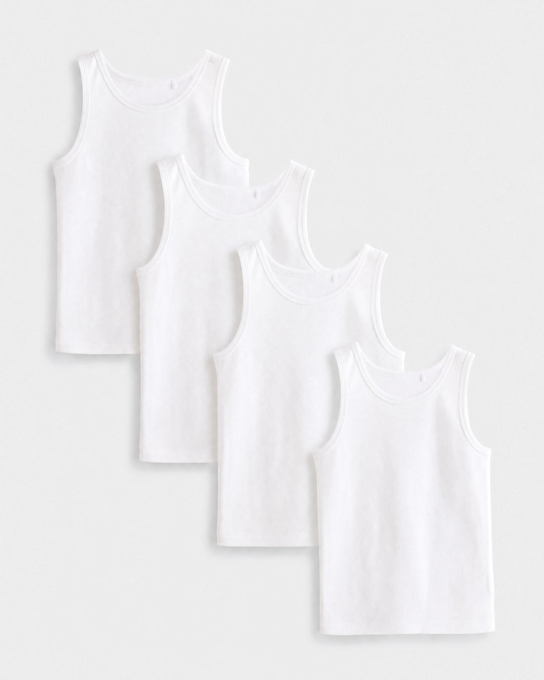 PTex Fashion boys' 4-pack white cotton sleeveless undershirt vest set for school, flat lay view