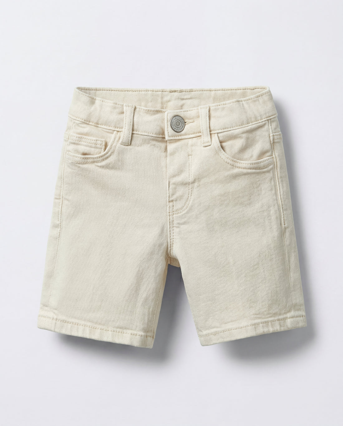 Ecru cream denim Bermuda shorts for boys, front view showing five-pocket styling, antique silver-tone shank button, zip fly, and belt loops on natural undyed cotton denim.
