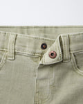 Detailed view of waistband, belt loops, and copper star-embossed shank button on sage green boys' denim Bermuda shorts, highlighting authentic denim hardware and clean stitching.
