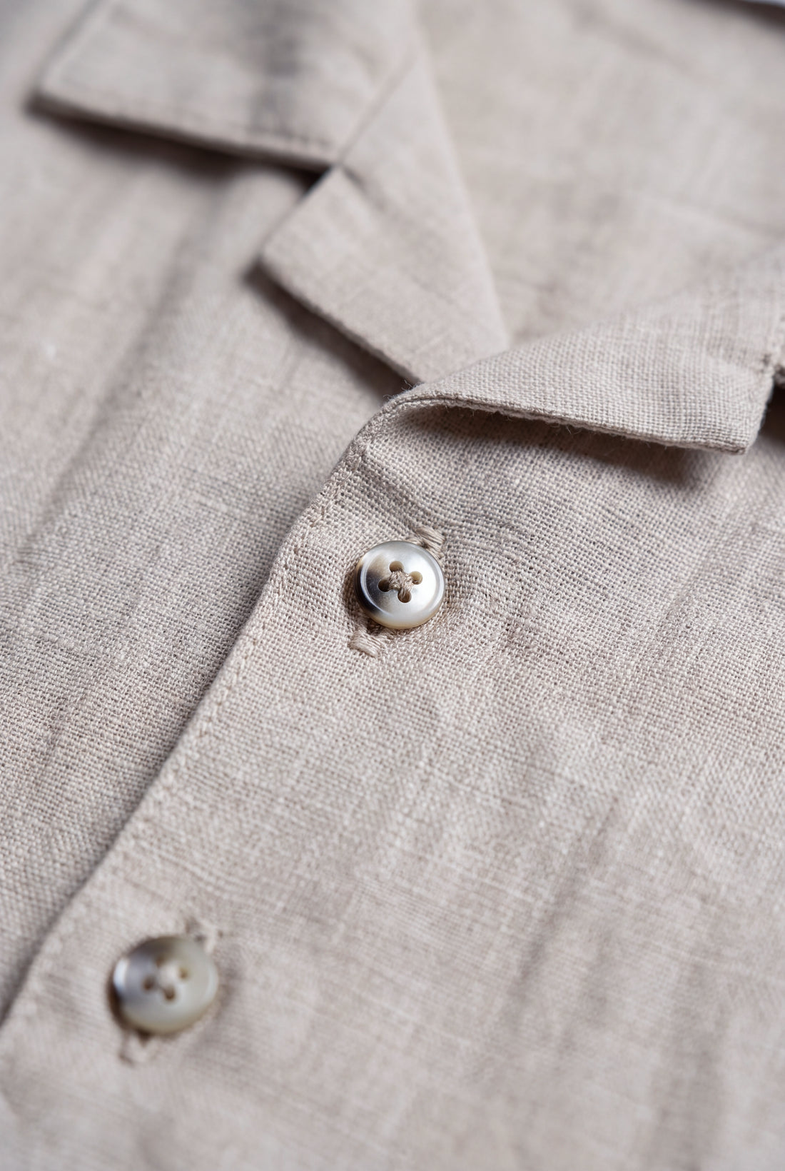 Boys beige linen blend short sleeve button-up shirt with camp collar and natural woven texture