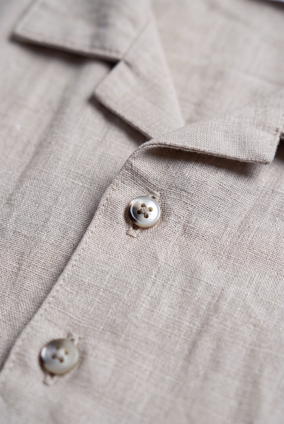 Boys beige linen blend short sleeve button-up shirt with camp collar and natural woven texture