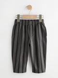 PTex Fashion charcoal and grey striped kids' trousers on a wooden hanger