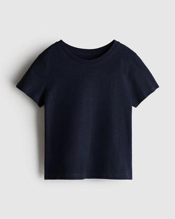 Boy's navy blue regular fit cotton t-shirt with ribbed crewneck and short sleeves, photographed flat on a soft white backdrop.