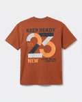 
Back view of boys' rust orange short-sleeve t-shirt with large 