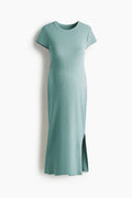 Dark mint midi dress with a front slit on a white background