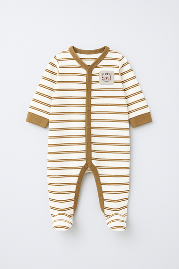 Striped baby onesie with a small patch on a white background