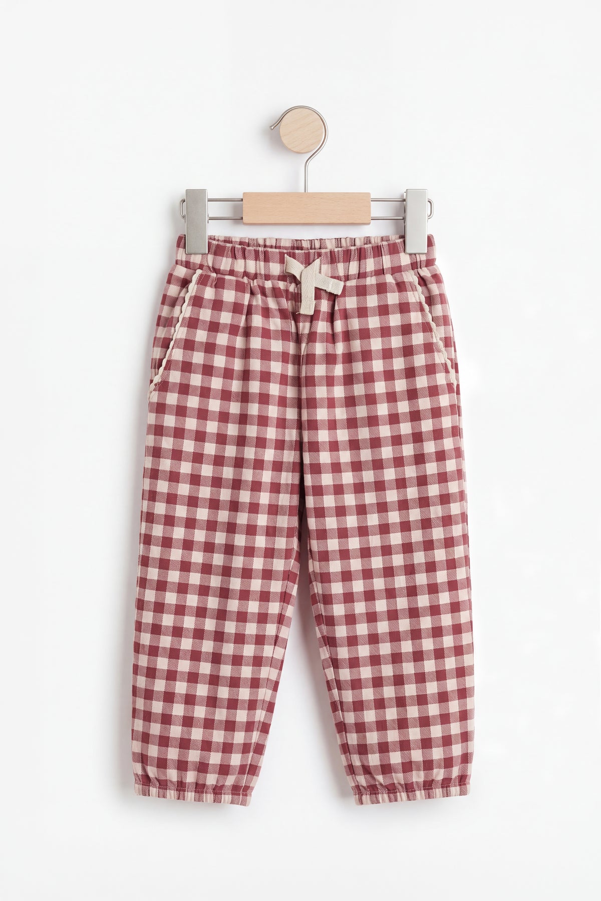Hanger flat shot: PTex Fashion girls' berry and cream gingham cotton pull-on trousers with cuffed hem