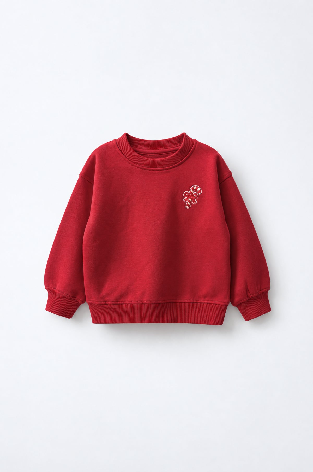 Girls’ soft fleece drop-shoulder sweatshirt with ribbed neckline, cuffs and hem, embroidered chest detail and back graphic.