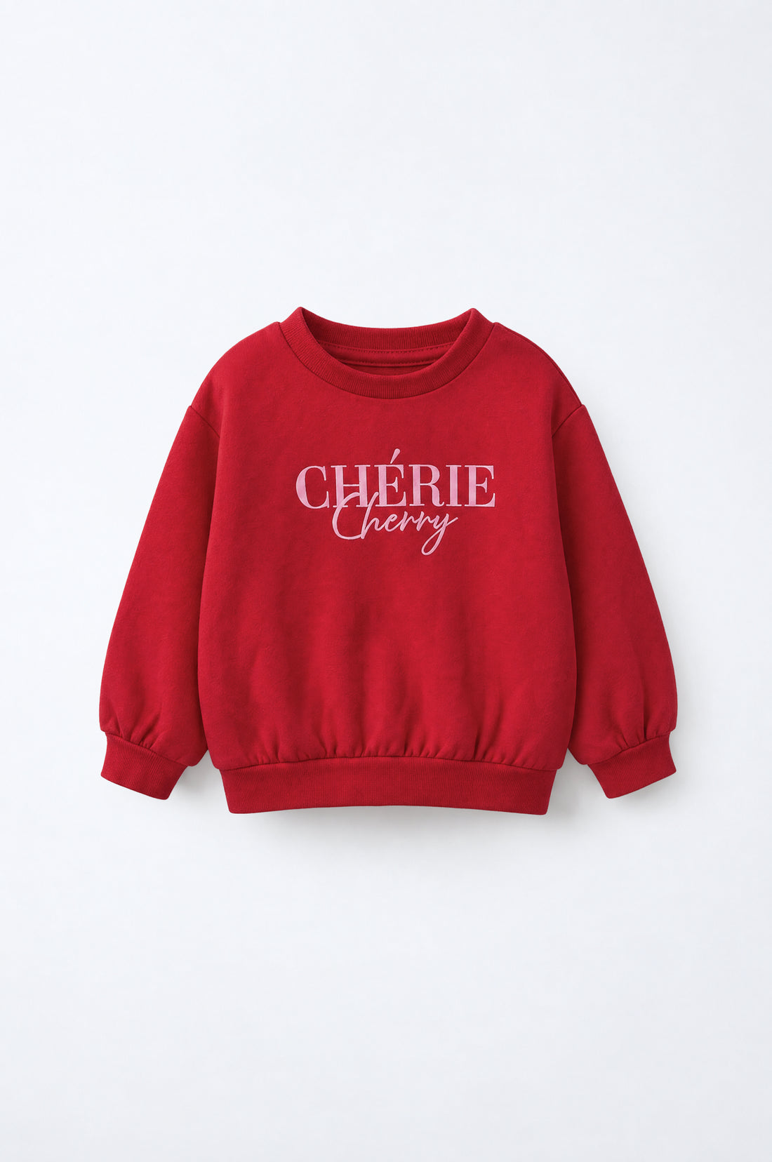 Girls’ Chérie Cherry puff print fleece sweatshirt with drop shoulders, ribbed crew neck, cuffs and hem.