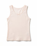 Girls soft peach mini dot sleeveless cotton tank top with lace trim neckline, armhole edging and small satin bow, flat lay product photo
