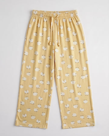 Girls’ soft cotton yellow palazzo trousers with all-over sheep print and elasticated drawstring waist