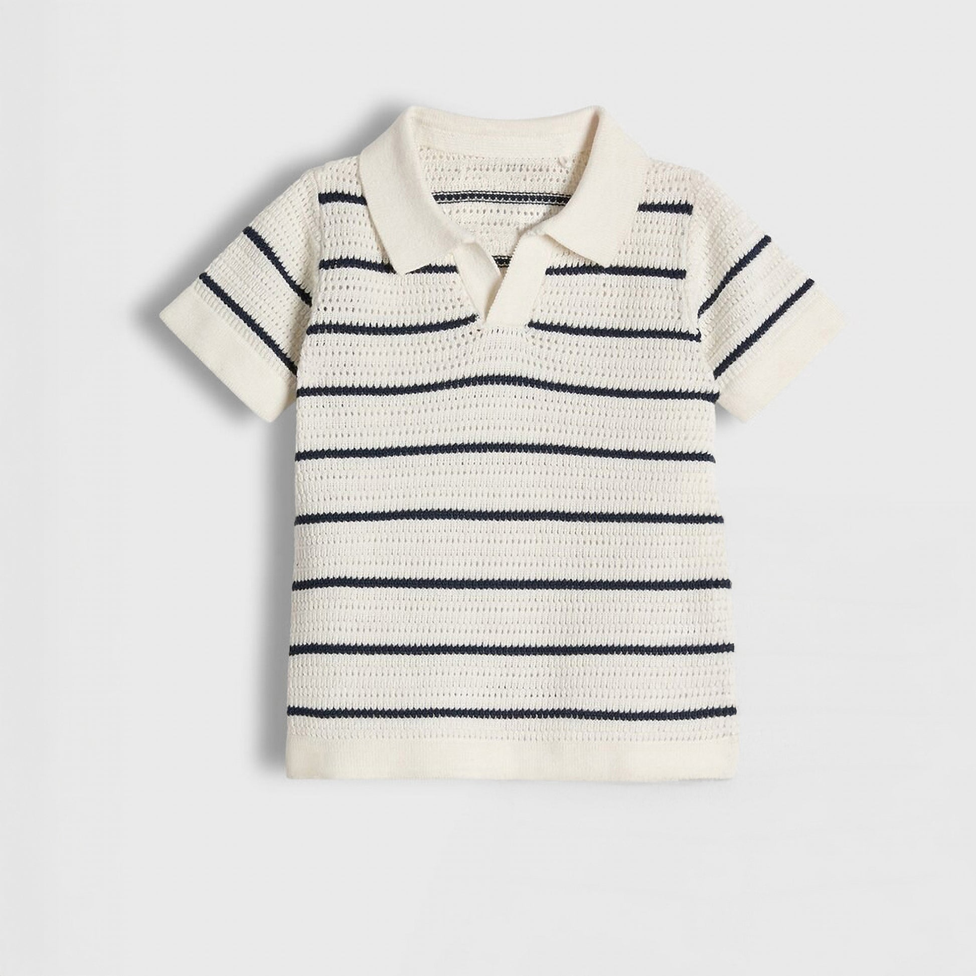 Striped knitted shirt on a light gray background