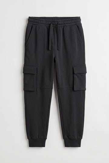 PTex Fashion kids' charcoal cargo jogger pants with drawcord waist and flap pockets, front view