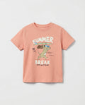 kid's salmon pink short sleeve cotton t-shirt with cartoon surfing animal, beach scene, and 