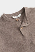 PTex Fashion kids’ mocha knit sweater close-up of ribbed neckline, henley placket and wood-effect buttons
