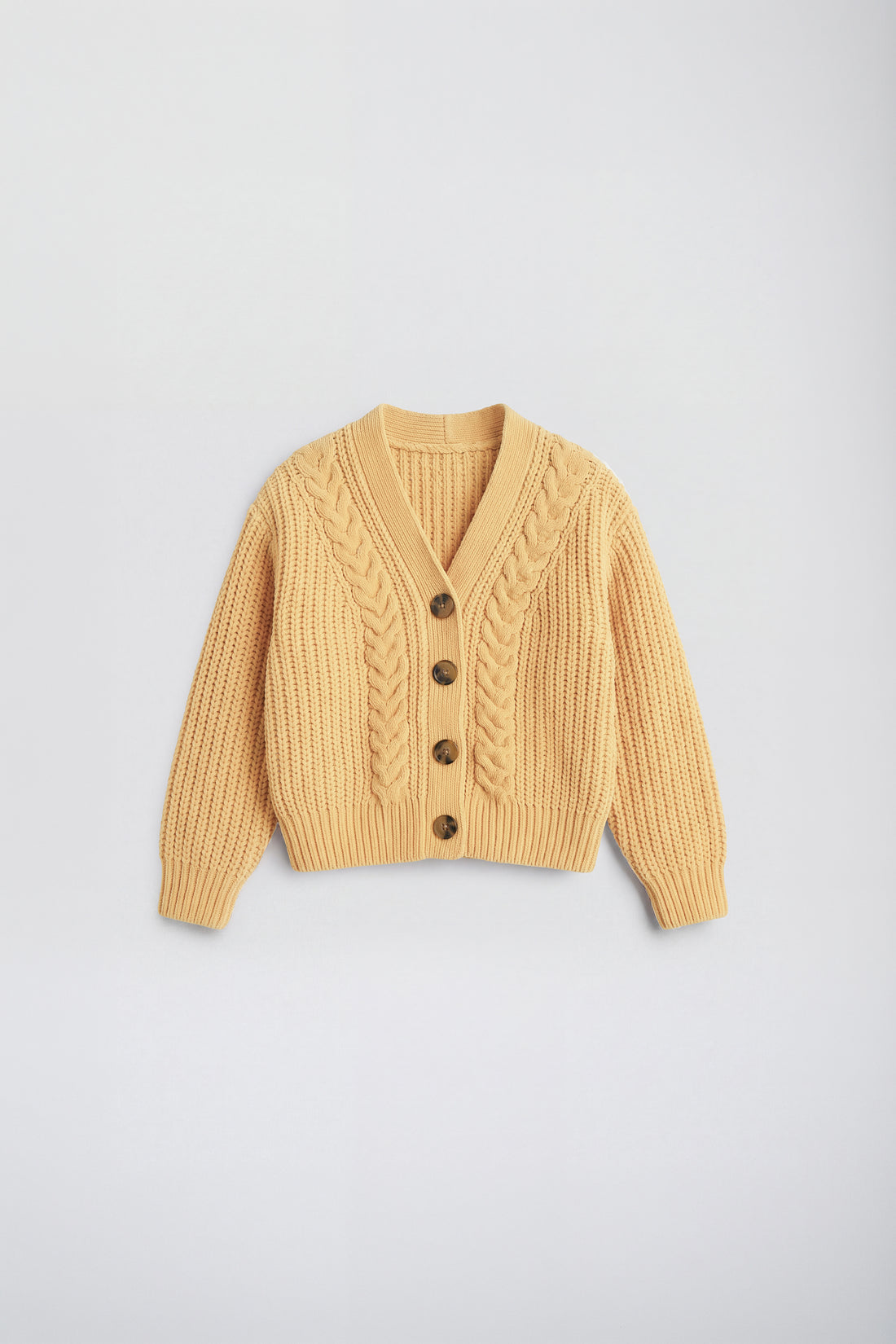PTex Fashion girls’ mustard yellow chenille cable knit boxy cardigan, front flat lay with four buttons