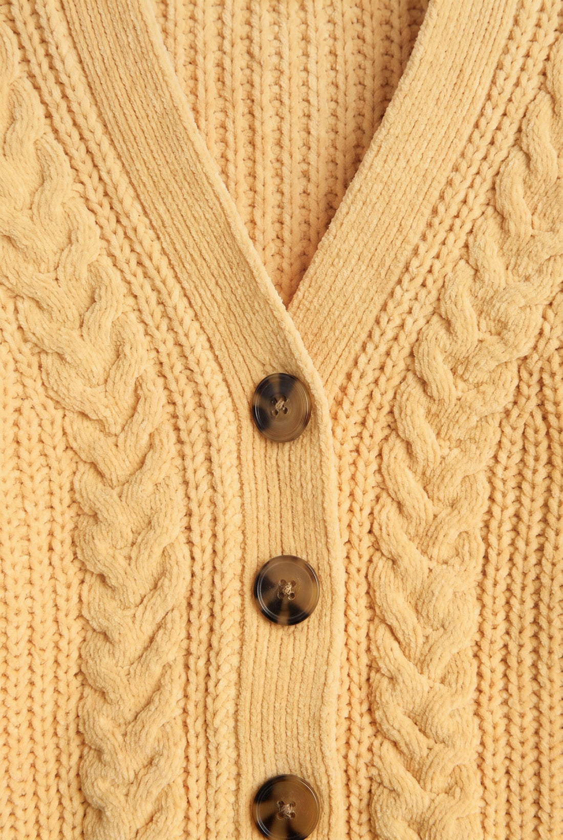 PTex Fashion girls’ mustard yellow chenille cable knit boxy cardigan, front flat lay with four buttons
