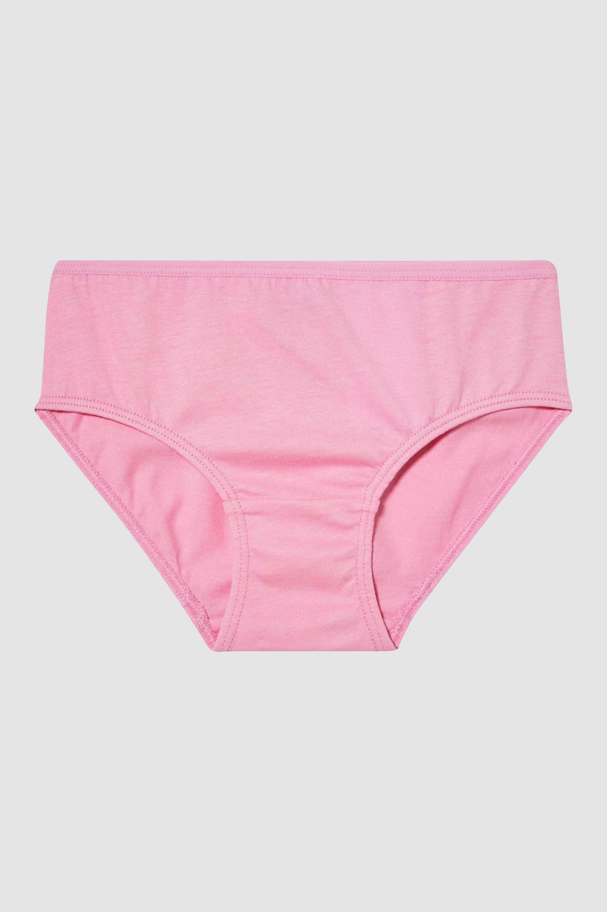 Girl's pink underwear on a light gray background