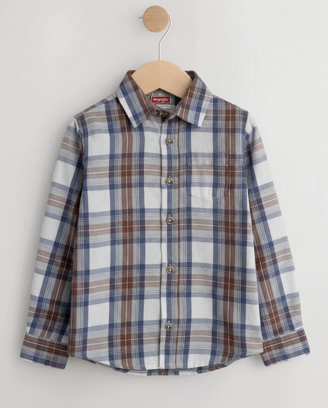 Plaid toddler shirt on a hanger against a white background