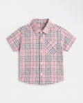 Flat lay of a PTex Fashion pink check short-sleeve button-up shirt for boys